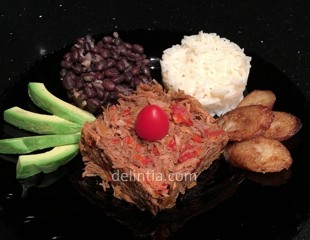 Venezuelan dish with pulled beef rice and black bean